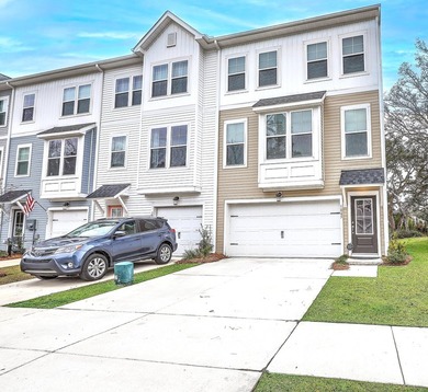 Built in the fall of 2024, this beautifully maintained end-unit - photo 2