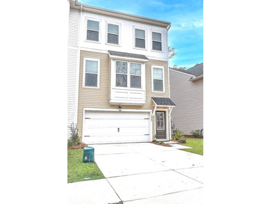 Built in the fall of 2024, this beautifully maintained end-unit - photo 3