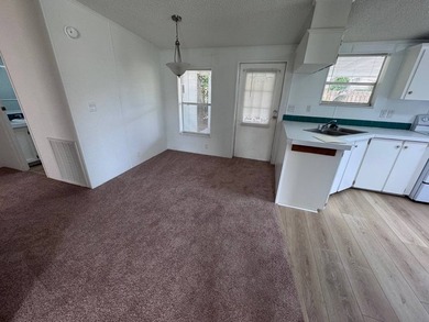 Welcome to this stunning two-bedroom, two-bath home that feels - photo 5