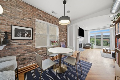 Stunning top-floor, three-bedroom, two-bathroom condo featuring - photo 3