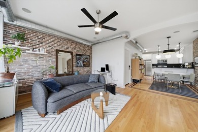 Stunning top-floor, three-bedroom, two-bathroom condo featuring - photo 7