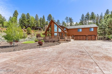 Nestled in a quiet cul-de-sac in Munds Park, this exceptional - photo 2