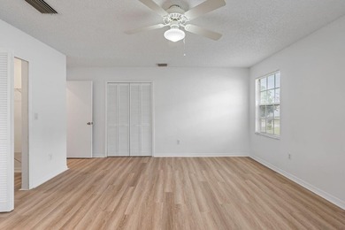 FRESHLY REMODELED Palm Bay home featuring a brand-new roof - photo 16