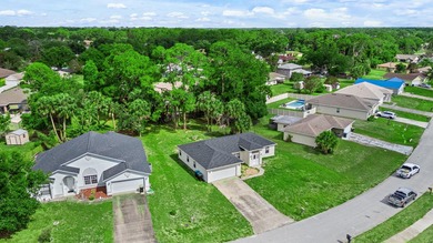 FRESHLY REMODELED Palm Bay home featuring a brand-new roof - photo 22
