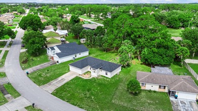 FRESHLY REMODELED Palm Bay home featuring a brand-new roof - photo 28