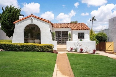 Welcome to this beautifully renovated single level Spanish home - photo 1