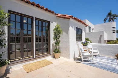 Welcome to this beautifully renovated single level Spanish home - photo 2