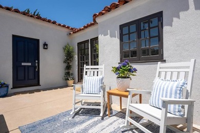 Welcome to this beautifully renovated single level Spanish home - photo 3