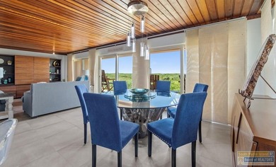 One-of-a-kind fully furnished beachfront condo! Completely - photo 1