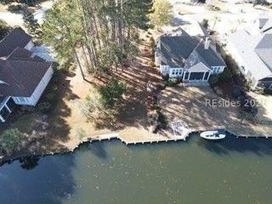 Premium waterfront homesite in Hampton Lake featuring a private - photo 9
