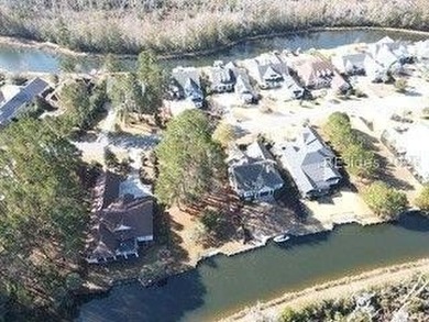 Premium waterfront homesite in Hampton Lake featuring a private - photo 10