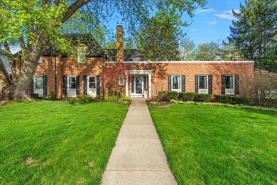 This beautifully classic and truly unique brick Colonial on a - photo 2