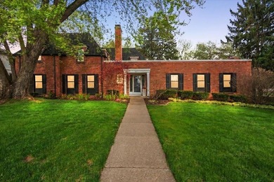 This beautifully classic and truly unique brick Colonial on a - photo 3