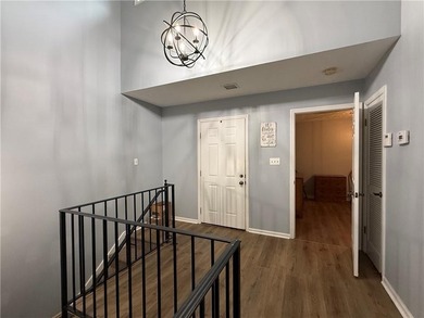 Discover effortless living in this beautifully maintained - photo 3