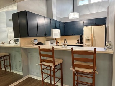 Discover effortless living in this beautifully maintained - photo 7