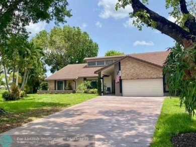 Lake Home For Sale in Coral Springs, Florida