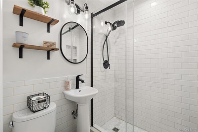 This beautifully renovated Colonial in East Islip sits on an - photo 11