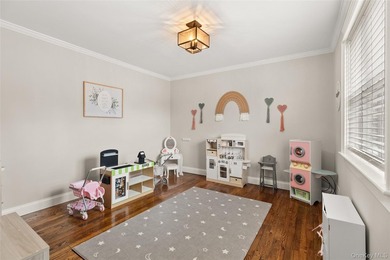 This beautifully renovated Colonial in East Islip sits on an - photo 12