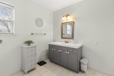 This beautifully renovated Colonial in East Islip sits on an - photo 15