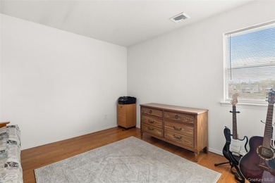 This beautifully renovated Colonial in East Islip sits on an - photo 17