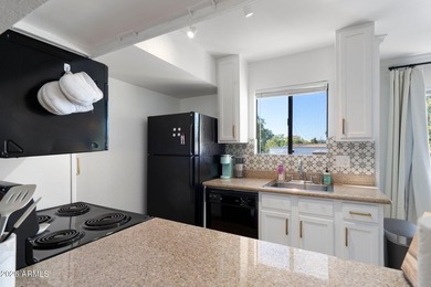 Step into this charming and rare corner unit, now available and - photo 8