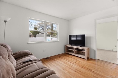 This beautifully renovated Colonial in East Islip sits on an - photo 18