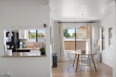 Step into this charming and rare corner unit, now available and - photo 9