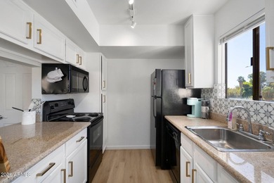 Step into this charming and rare corner unit, now available and - photo 10