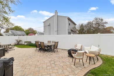 This beautifully renovated Colonial in East Islip sits on an - photo 22