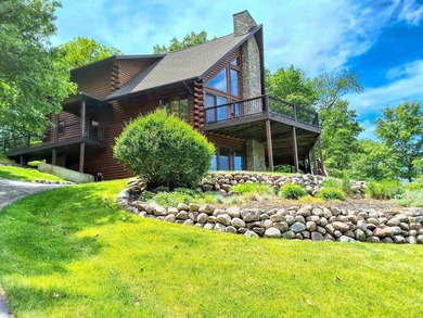 Tucked into a quiet bay with 152 feet of waterfront, this - photo 2