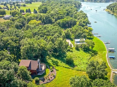 Tucked into a quiet bay with 152 feet of waterfront, this - photo 3