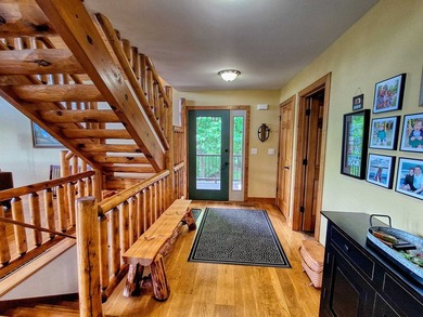 Tucked into a quiet bay with 152 feet of waterfront, this - photo 4