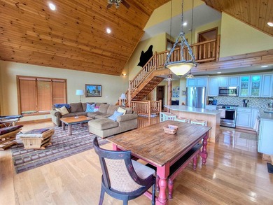 Tucked into a quiet bay with 152 feet of waterfront, this - photo 8