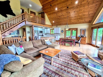 Tucked into a quiet bay with 152 feet of waterfront, this - photo 9
