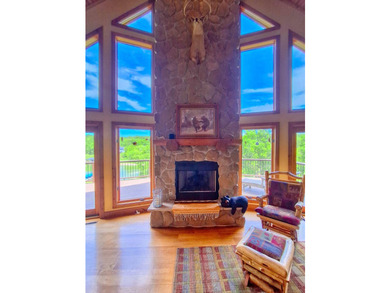 Tucked into a quiet bay with 152 feet of waterfront, this - photo 10