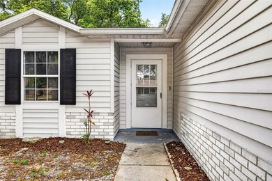 Set on over half an acre with serene conservation views, this - photo 3