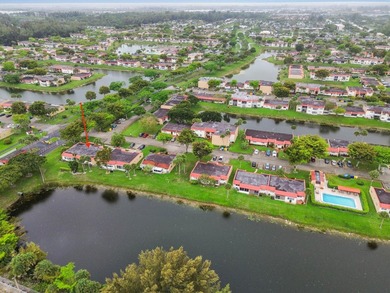 Step inside this beautiful 2-bedroom, 2-bathroom end-unit villa - photo 2