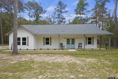 Gorgeous new construction in Kings Country! This 3 bed 2.5 bath - Lake Home For Sale in Scroggins, Texas