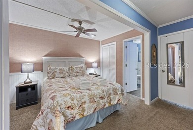 This well-maintained one-bedroom oceanside villa is located - photo 7