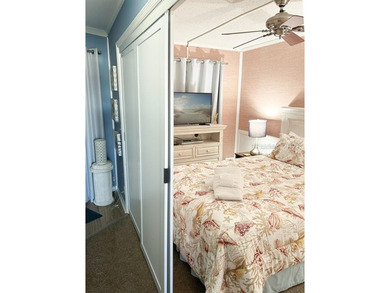 This well-maintained one-bedroom oceanside villa is located - photo 10