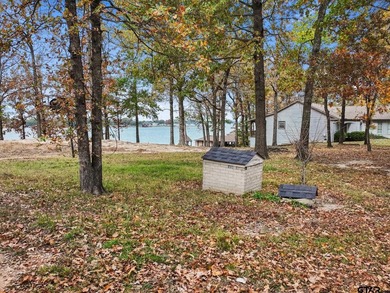 Nestled in the prestigious Hills Point lake community, this - photo 5