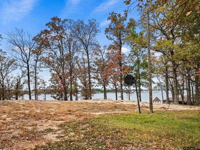 Nestled in the prestigious Hills Point lake community, this - photo 6