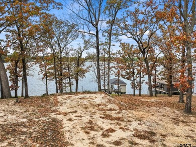 Nestled in the prestigious Hills Point lake community, this - photo 7