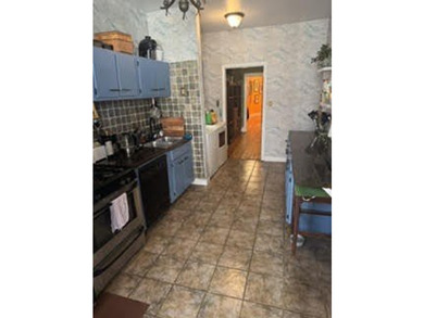 Experience timeless charm in this spacious first-floor vintage - photo 9