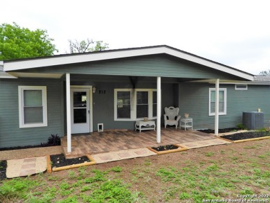 Relax in this spacious,immaculately presented remodelled home on - Lake Home For Sale in Lakehills, Texas