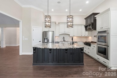 This stunning Waterfront home in the sought-after gated - photo 9