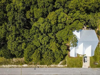 Located in the gated community of Bear Creek, this - photo 2