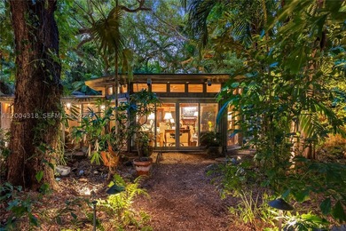 Tucked along one of Coconut Grove's most coveted streets, this - photo 1