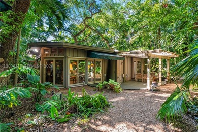 Tucked along one of Coconut Grove's most coveted streets, this - photo 3