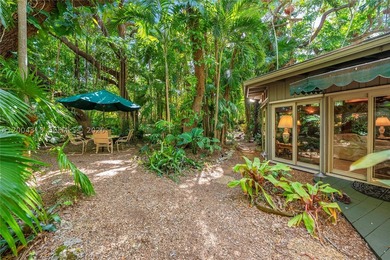 Tucked along one of Coconut Grove's most coveted streets, this - photo 4